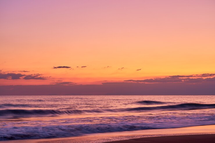 Photo 熱帯のビーチでカラフルな夕日