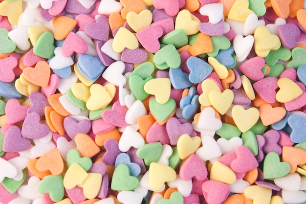 Colorful sweet candy hearts background