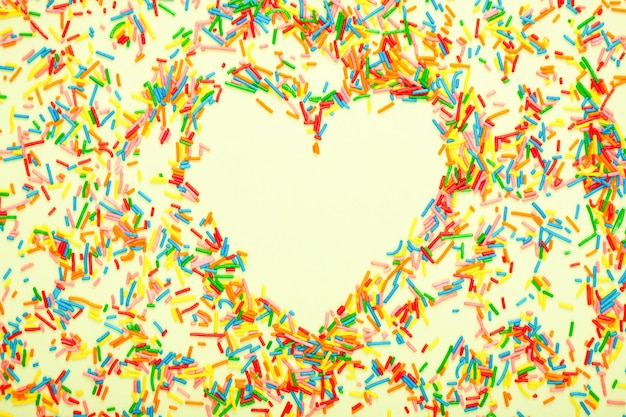 Photo colorful sweet sugar sprinkles with a heart