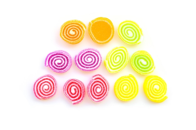 Colorful sweets and sugar candies on a white background