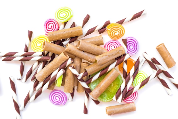 Colorful sweets and sugar candies on a white background