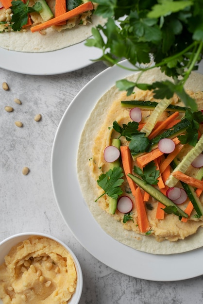 Colorful and tasty hummus with ingredients