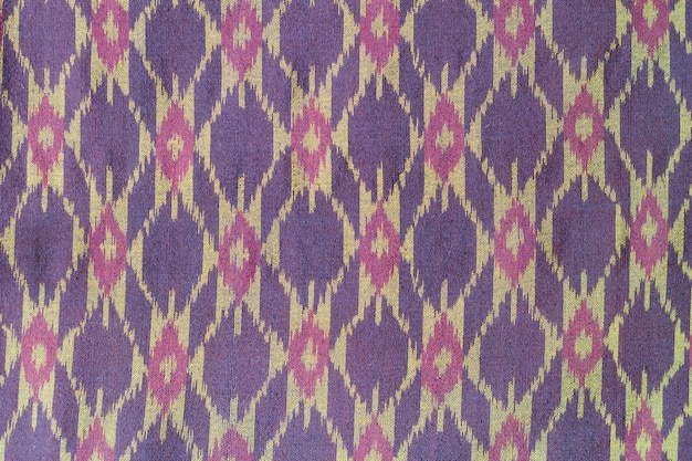 Colorful Thai fabric pattern as background.