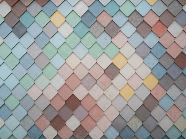 Photo a colorful tile floor with a pattern of different colors