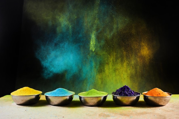 Colorful traditional Holi powder in bowls Happy Holi Concept Indian color festival