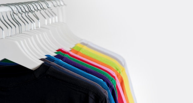 Colorful tshirts hanging on a rack