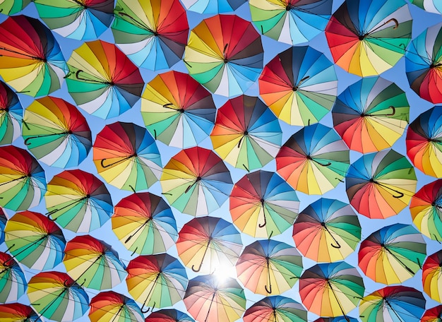 Colorful umbrellas hanging over the city streets