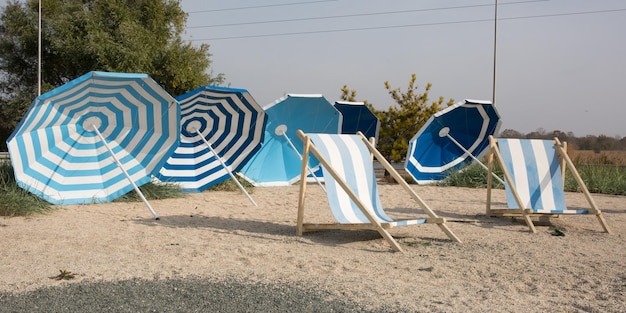 Colorful umbrellas lounge chairs