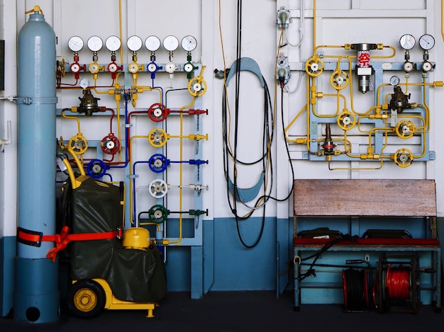 Colorful valves of ship in control room