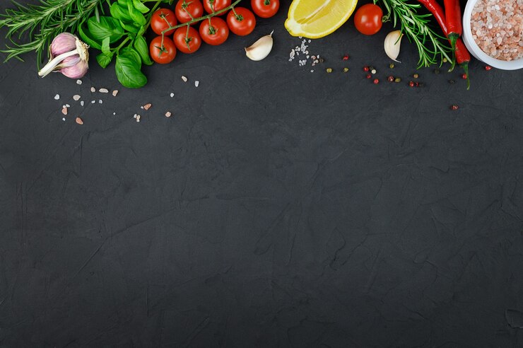 Photo colorful various herbs and spices for cooking on dark background.