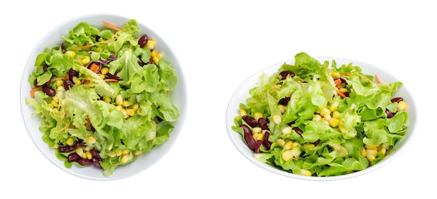 Colorful vegetable salad in dish isolated on white background with clipping path