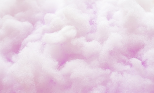 Photo colorful violet fluffy cotton candy background, soft color sweet candyfloss