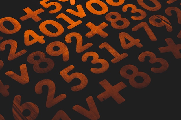 Colorful wooden numbers background.