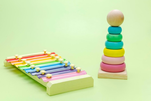 Colorful wooden pyramid and xylophone toy