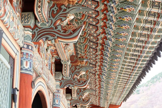 Colorful wooden roof structure in a Korean buddhist temple
