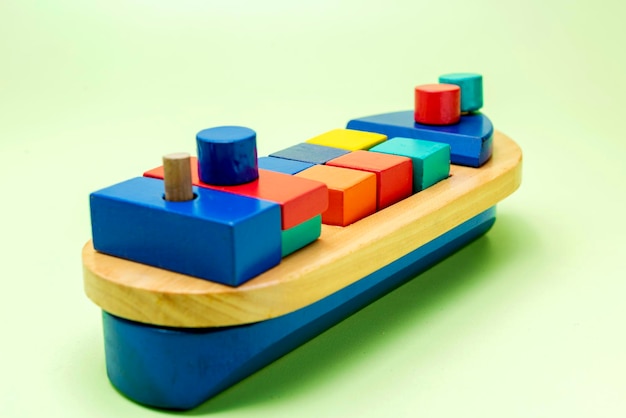 A colorful wooden toy ship