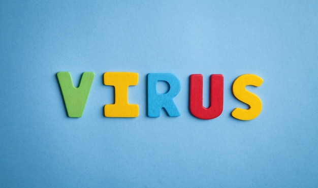 Colorful word Virus on the blue background.