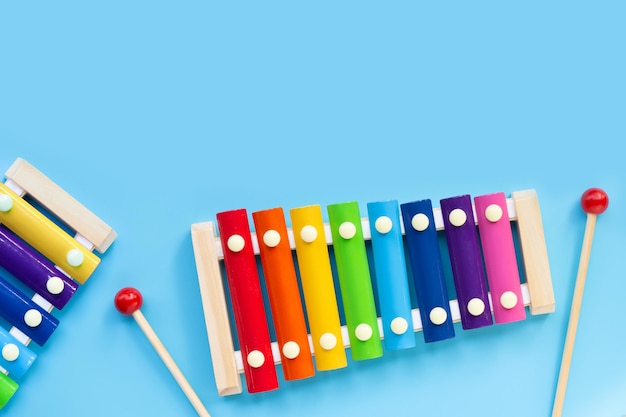 Colorful xylophone on blue background