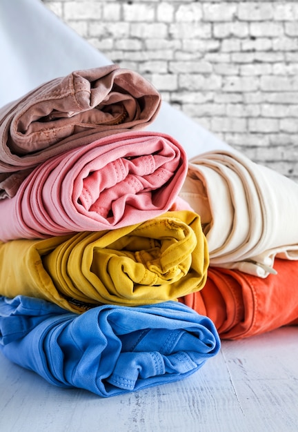 Colors pants on wooden table