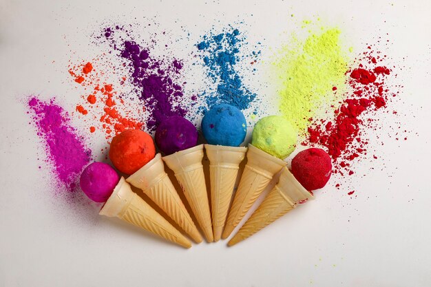 Colors in shapes of ice cream scoops in cones for Indian holi festival