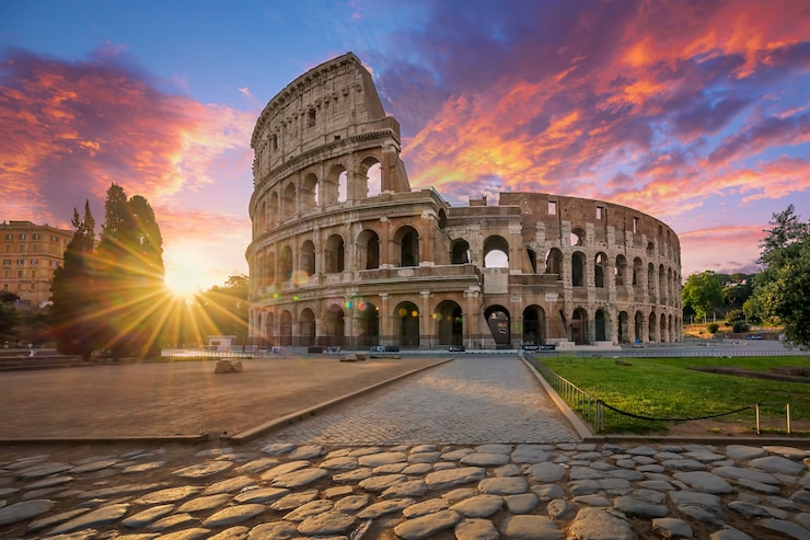 Foto colosseum in rome met ochtendzon, italië, europa