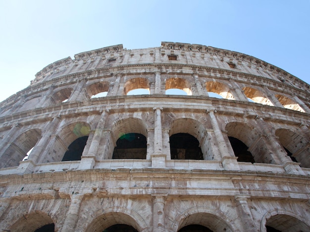 Colosseum in Rome with blue sky in the background