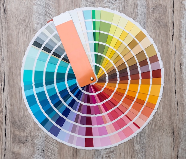 Colour swatch on wooden background lay out in circle