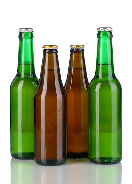 Coloured glass beer bottles on blue background