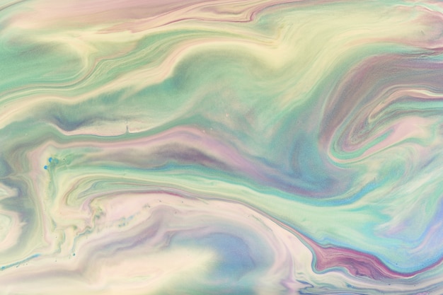 カラフルなアクリルの泡。流体アート大理石のテクスチャ。背景の抽象的な虹色のペイント効果。液体のアクリルアートワークが流れて飛散します。インテリアポスター用混合塗料。