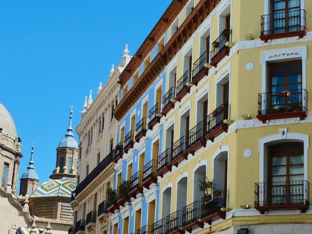 Colourful building facades on main street downtown Zaragoza Aragon Spain