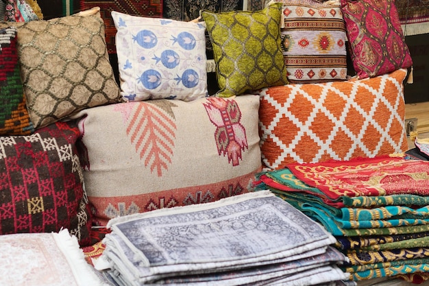 Colourful cushions on display for sale in a traditional turkish bazaar