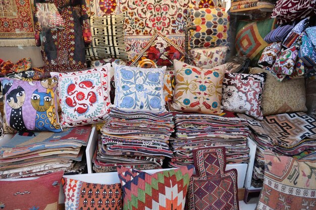 Colourful cushions on display for sale in a traditional turkish bazaar