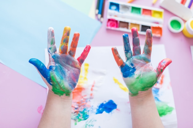 colourful Painted little girl fingers