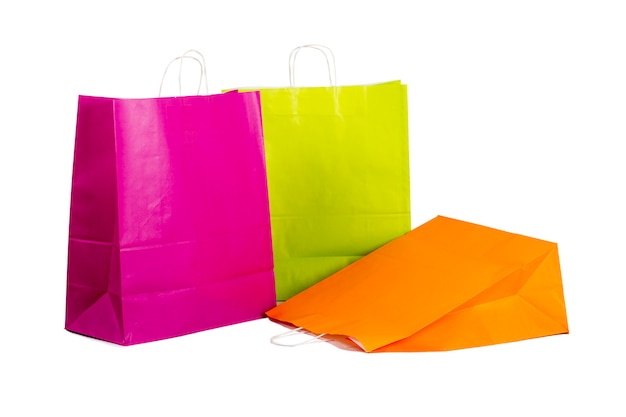 Colourful paper shopping bags isolated on white