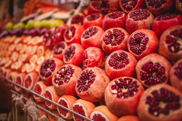 Colourful picture of oranges and pomegranates on the market