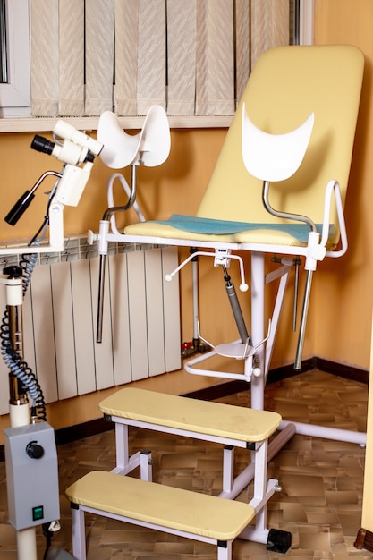 Colposcope in gynecologist office. gynecological chair in hospital. Health checkup