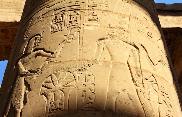 Photo column with ancient egypt images and hieroglyphics