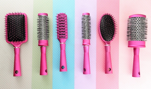 Comb brushes on bright background