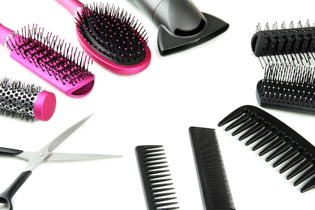 毛ブラシヘアドライヤーカッティングシージーホワイトに隔離されたもの