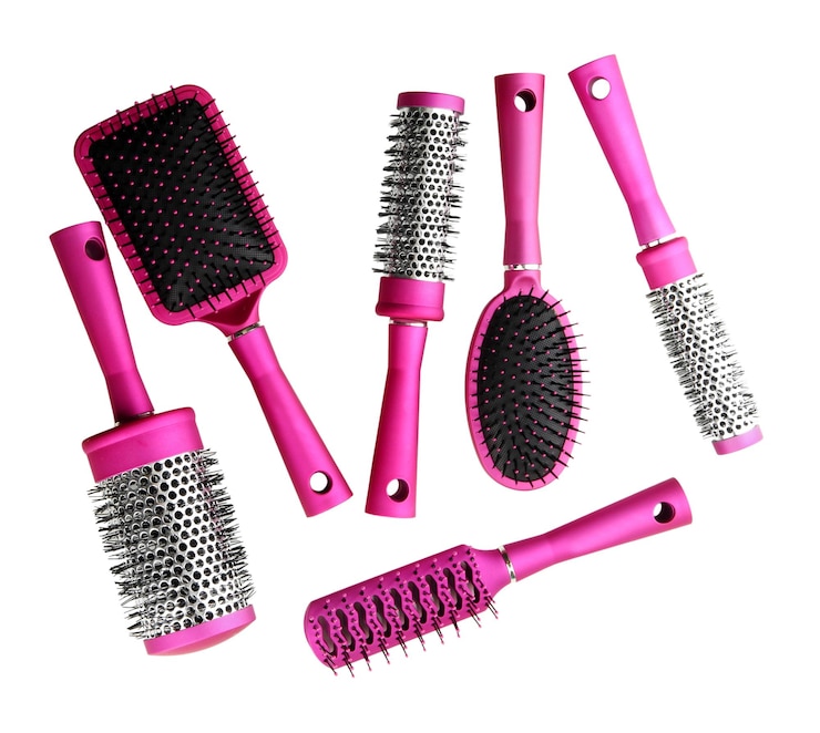 Photo comb brushes isolated on white