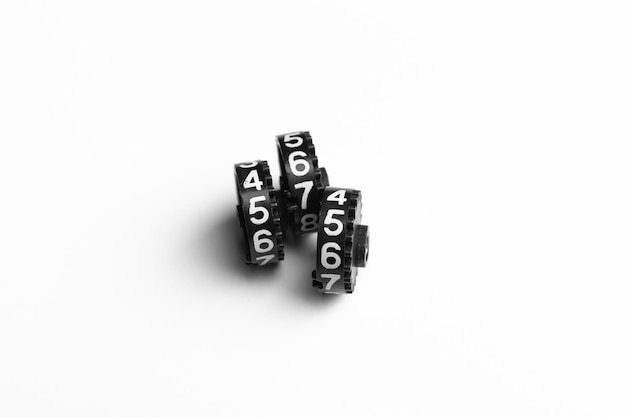 A combination lock rotating discs on a white background