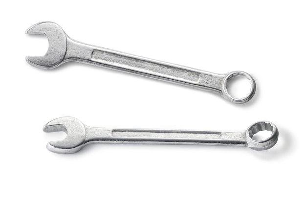 A combination openended and boxended wrench isolated on white background Maintenance concept