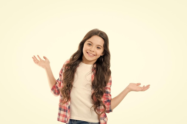 Come on Lets have fun Carefree and joyful Kid girl carefree expression I do not know Take it easy Child with long curly hair feeling cheerful and carefree Happy childhood Fun and relax