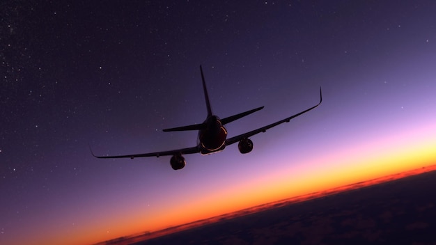 Comercial airplane flying over the amazing sunset