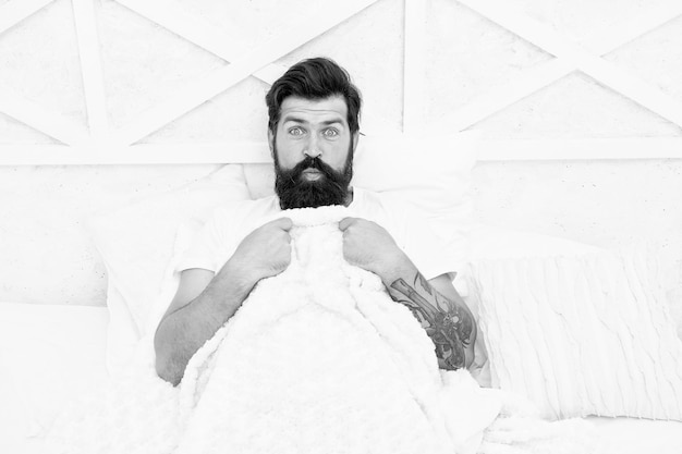 Comfort and relax tips sleep better bearded man relaxing\
circadian rhythm is natural internal process that regulates sleep\
wake cycle handsome man in bed enough amount sleep every night