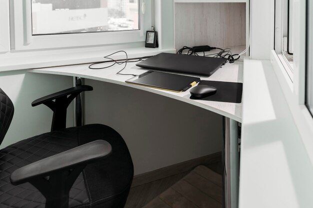 Comfortable home workplace for graphic designer with graphics tablet