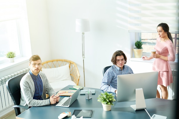 Comfortable meeting room with company staff