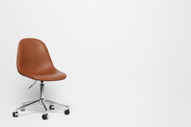 Comfortable office chair on white background space for text