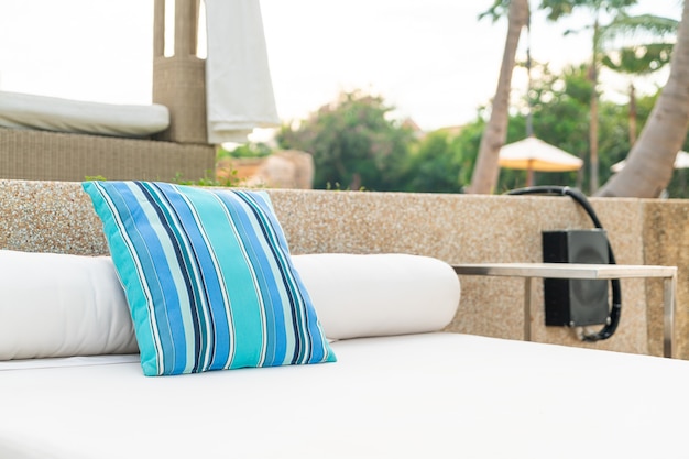 comfortable pillow on pavilion near beach - travel and vacation concept