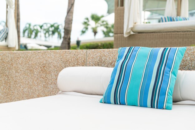 comfortable pillow on pavilion near beach - travel and vacation concept